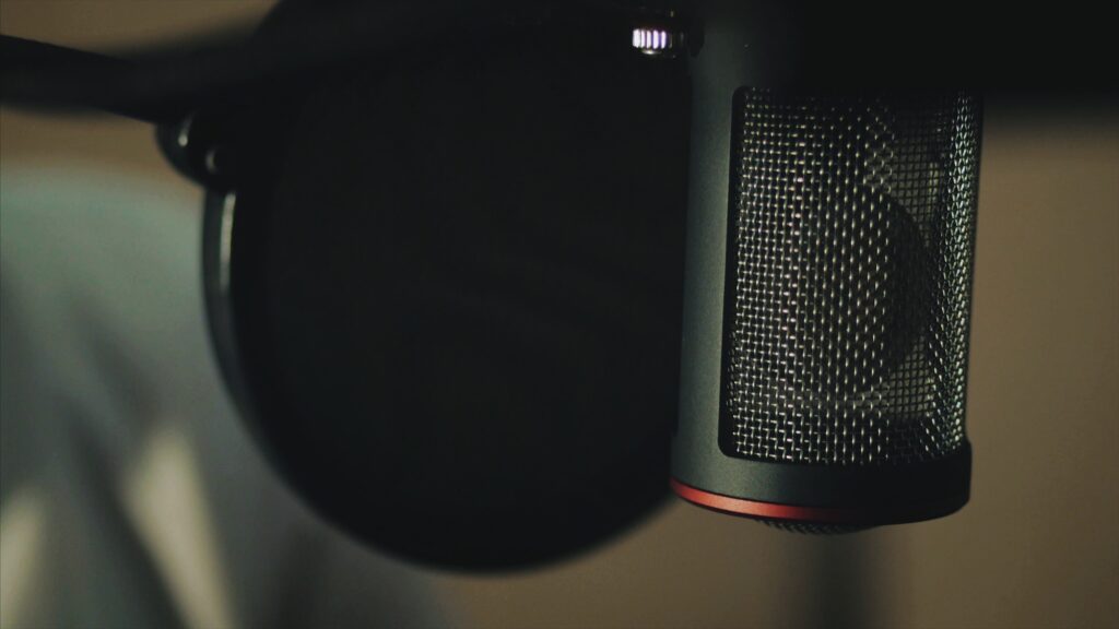 Close up view of microphone in music professional studio. recording a music track, songs, rapping