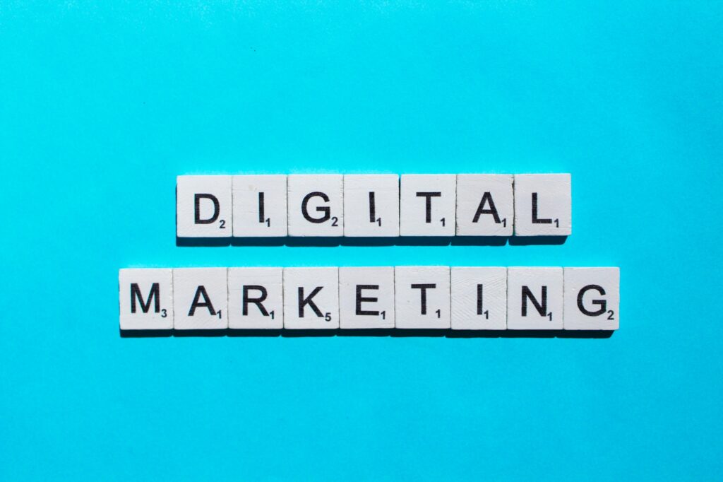 Digital marketing scrabble letters word on a blue background