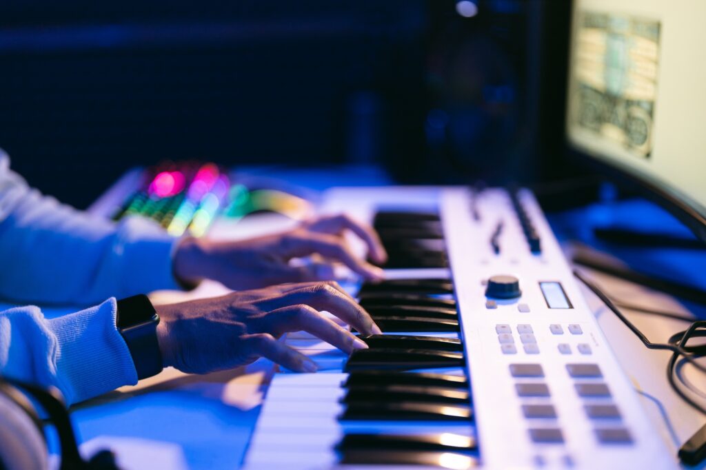 Man working in a modern technological sound and visual studio
