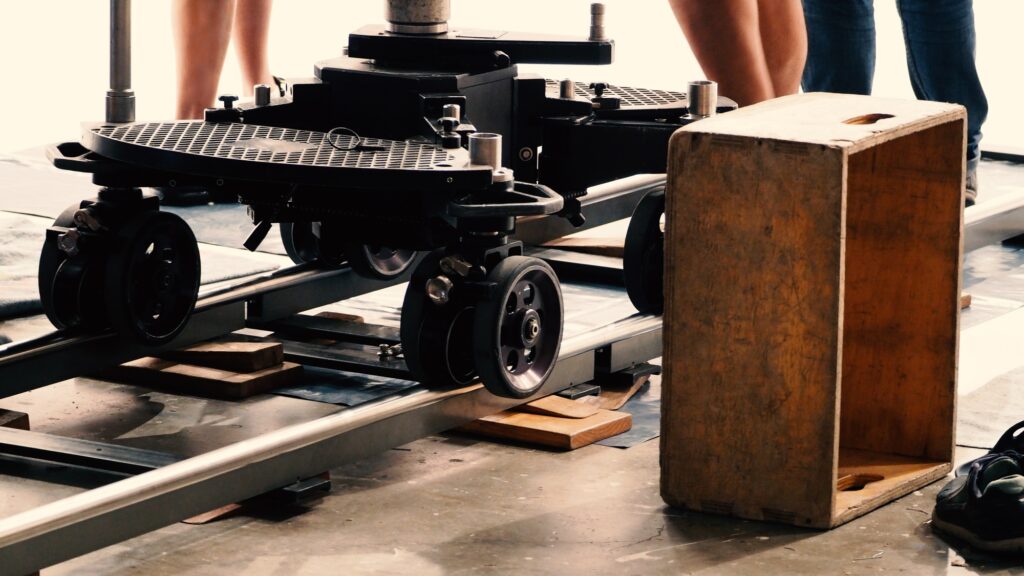 Setting dolly track for video shooting production