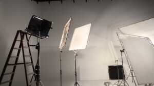 Studio light and back drop and soft box set up for shooting photo or video production which includes