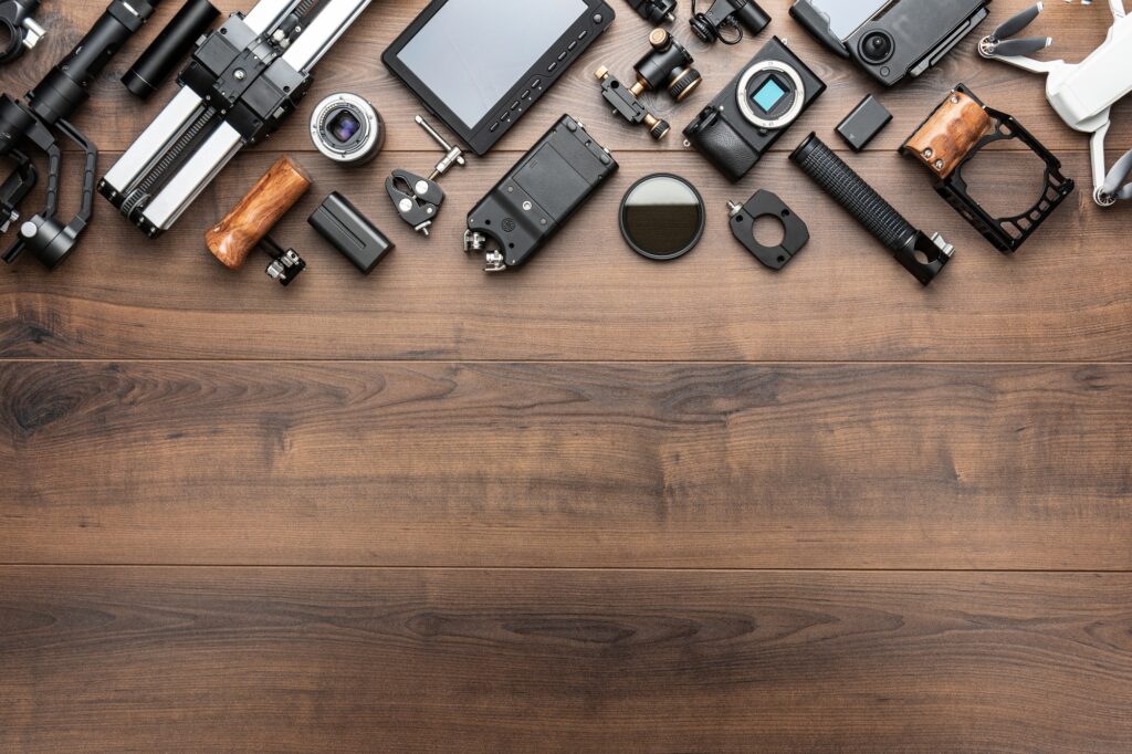 Video Production Tools on Brown Table View from Above